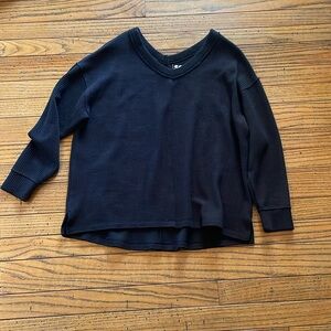 Black v neck sweater. Brand is SO. Size M.